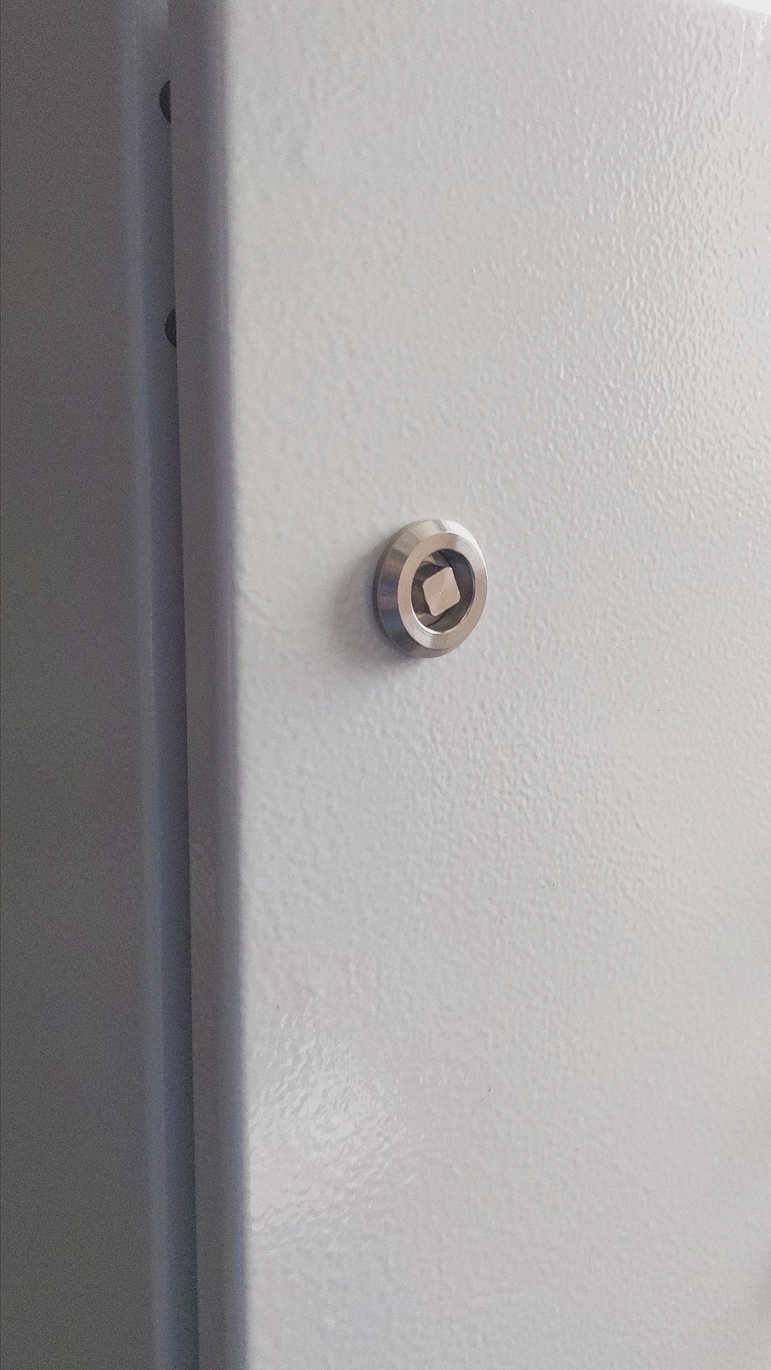 CabKey universal key opening a square service cabinet lock during a how-it-works demonstration